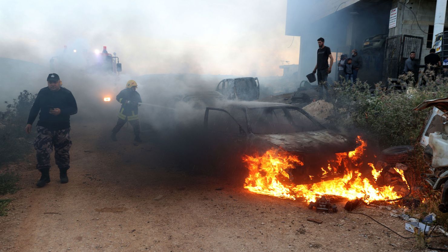 A view of damaged houses and burning vehicles after a raid by Jewish settlers on the Mughir town near Ramallah, West Bank on April 12, 2024.