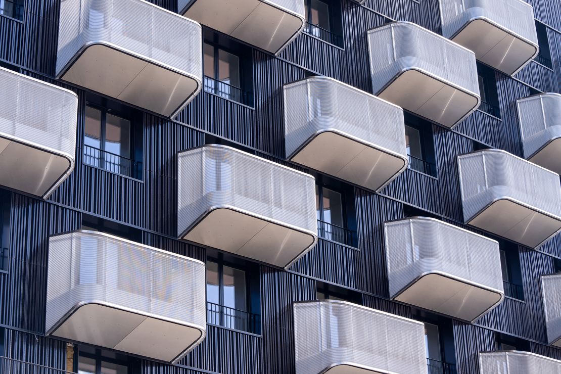 Balconies on a block of athletes' accommodation in the Olympic Village in Saint-Denis. The Olympic Village, north of Paris, will be an eco-quarter where all buildings under eight floors will be made from wood and glass, and all energy will be sustainably sourced via heat pumps and renewables.