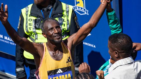Sisay Lemma celebrates win the men's event at the 128th Boston Marathon.