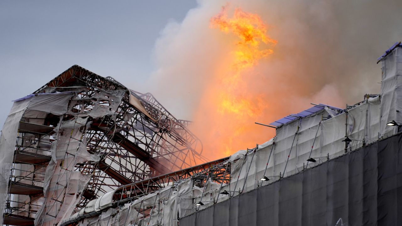 This photograph shows flames engulfing the Copenhagen's Stock Exchange building, in Copenhagen, on April 16, 2024. (Photo by Emil Helms / Ritzau Scanpix / AFP) / Denmark OUT (Photo by EMIL HELMS/Ritzau Scanpix/AFP via Getty Images)