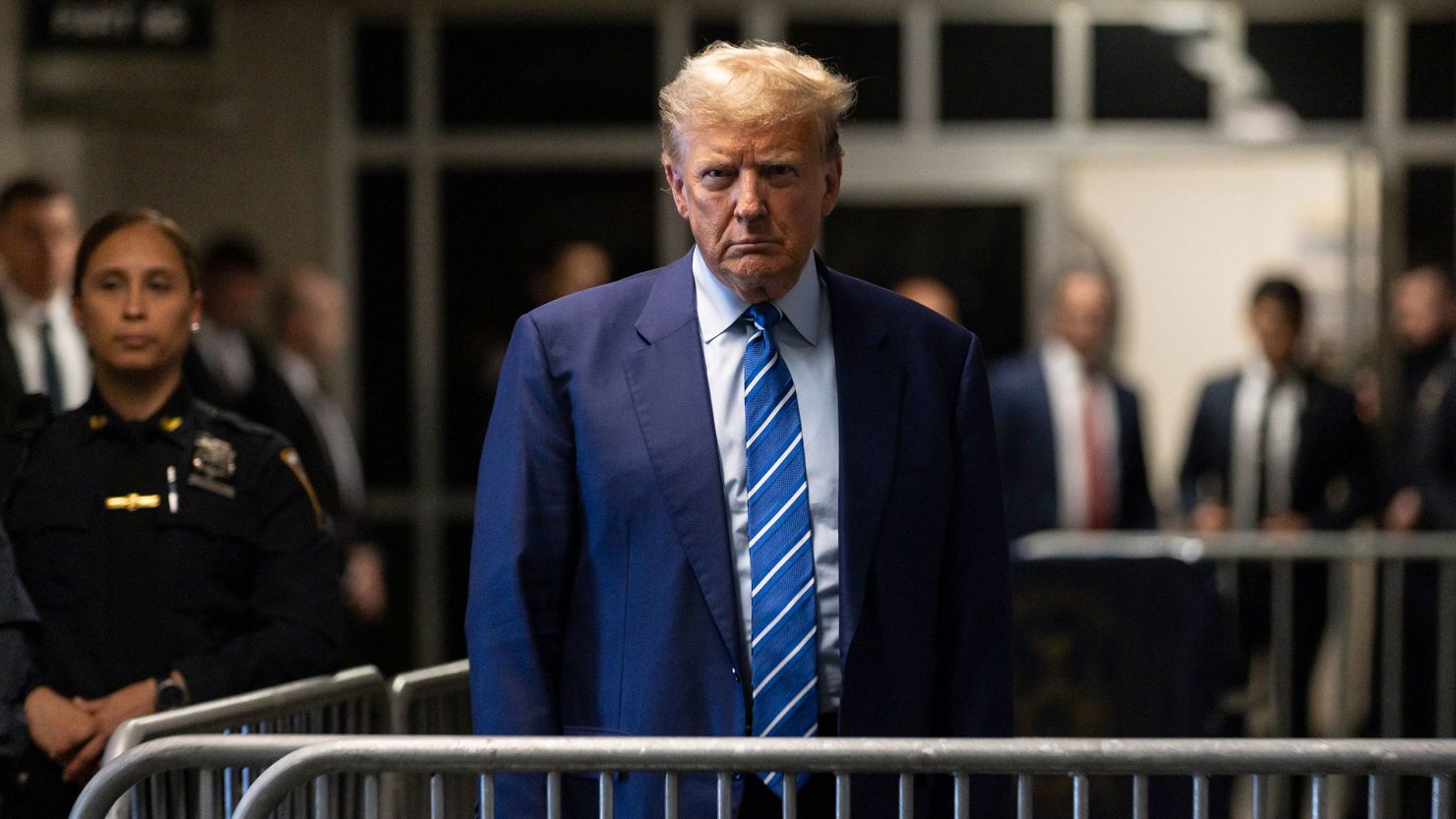 Former President Donald Trump talks to reporters at the conclusion of the second day of jury selection for his criminal trial at Manhattan Criminal Court on April 16, 2024.