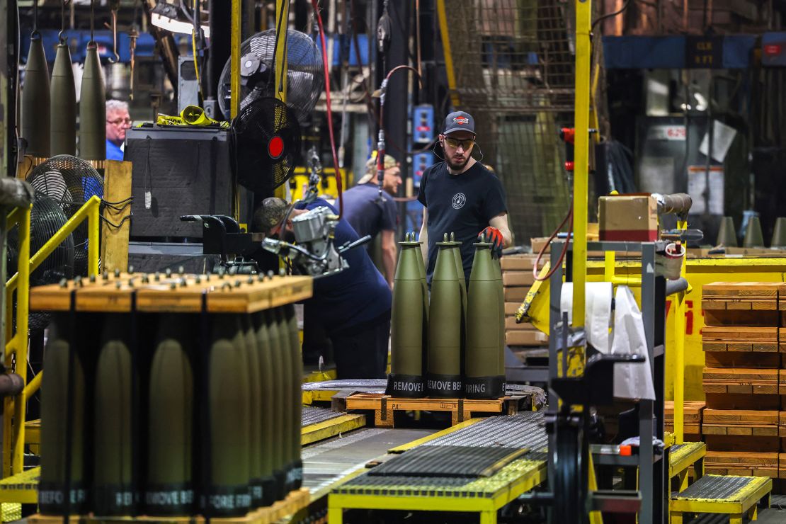 A worker prepares 155 mm caliber shells for shipment at the packaging area of the Scranton Army Ammunition Plant in Scranton, Pennsylvania on April 16, 2024.