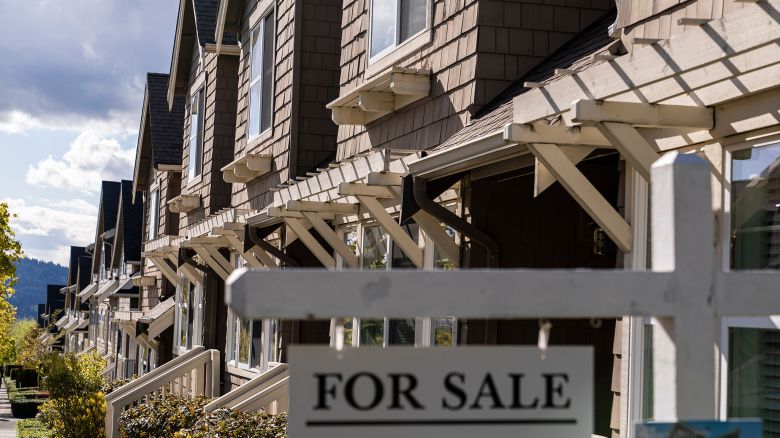 A "For Sale" sign in front of a home in the Issaquah Highlands area of Issaquah, Washington, US, on Tuesday, April 16, 2024. The National Association of Realtors is scheduled to release existing homes sales figures on April 18. Photographer: David Ryder/Bloomberg via Getty Images