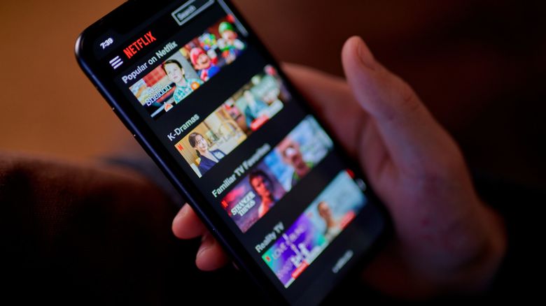 The Netflix app on a smartphone arranged in the Queens borough of New York, US, on Tuesday, March 26, 2024. Netflix Inc. is scheduled to release earnings figures on April 18. Photographer: Gabby Jones/Bloomberg via Getty Images