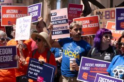 Members of Arizona for Abortion Access, the ballot initiative to enshrine abortion rights in the Arizona State Constitution, hold a press conference and protest condemning the 1864 abortion ban during a recess from a legislative session at the Arizona House of Representatives on April 17, 2024 in Phoenix, Arizona.