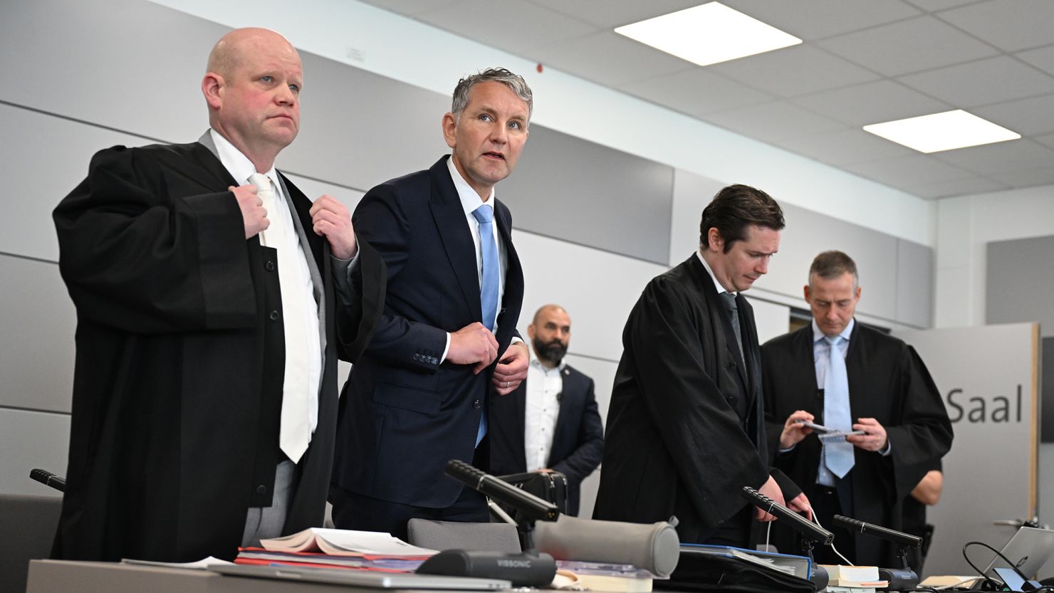 Björn Höcke, chairman of the Thuringian AfD (second from left) stands next to his lawyers during the trial on April 18, 2024.