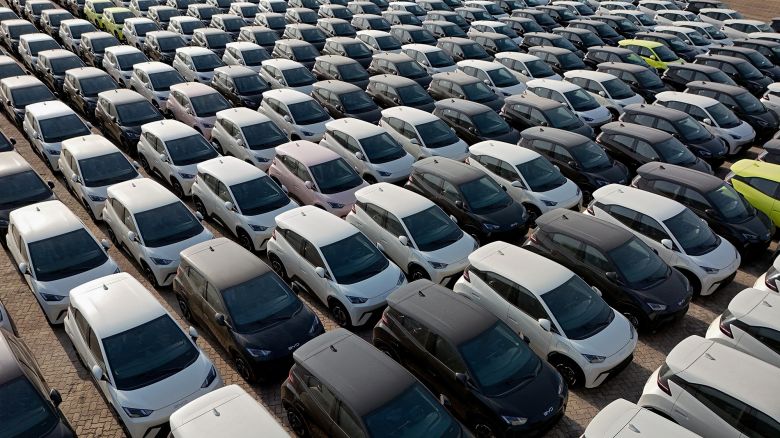 This photo taken on April 18, 2024 shows BYD electric cars for export waiting to be loaded onto a ship at a port in Yantai, in eastern China's Shandong province.