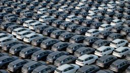 This photo taken on April 18, 2024 shows BYD electric cars for export waiting to be loaded onto a ship at a port in Yantai, in eastern China's Shandong province.