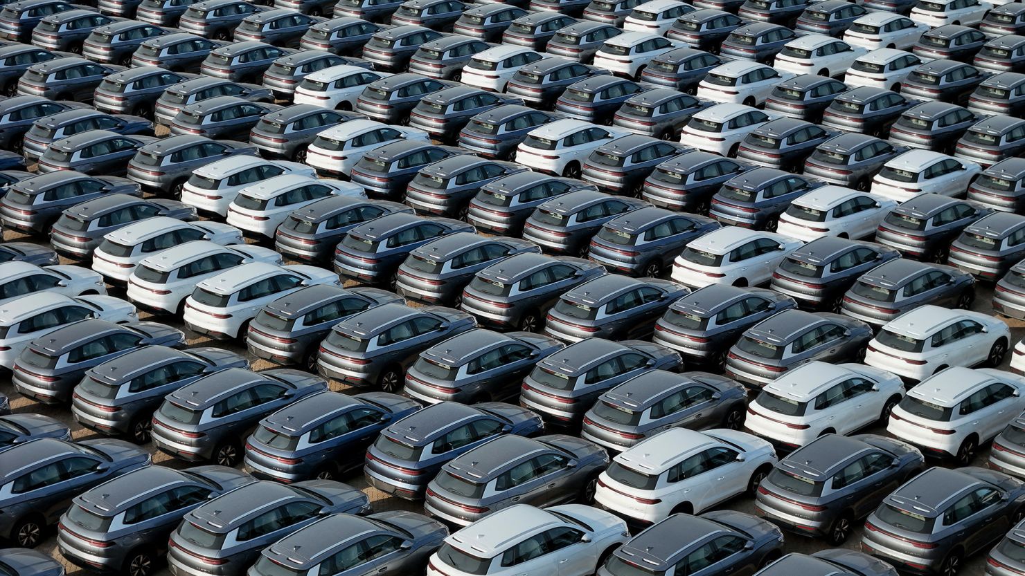 BYD electric cars waiting to be loaded onto a ship for export at a port in Yantai in eastern China's Shandong province in April 2024.