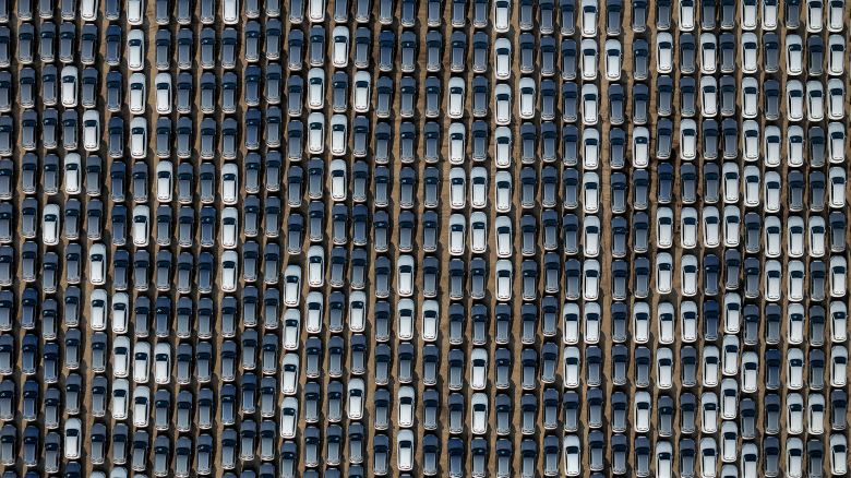 BYD electric cars waiting to be loaded onto a ship at a port in Yantai, in eastern China's Shandong province.