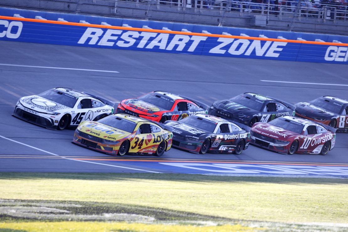 TALLADEGA, AL – APRIL 21: Michael McDowell (#34 Front Row Motorsports Love's Travel Stops Ford) leads Tyler Reddick (#45 23XI Racing Jordan Brand Toyota) in the tri-oval during the NASCAR Cup Series GEICO 500 on April 21, 2024 at the Talladega SuperSpeedway in Talladega, AL. (Photo by Jeff Robinson/Icon Sportswire via Getty Images)