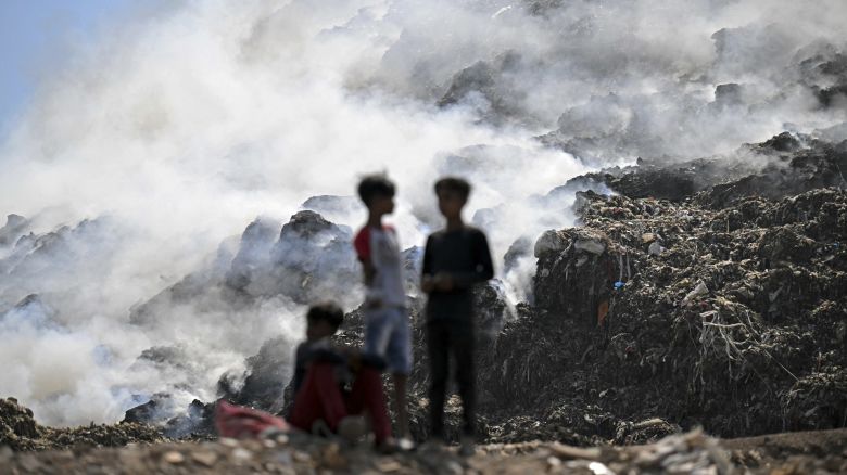 Smoke billows from a fire that broke out at the Ghazipur landfill in New Delhi on April 22, 2024.
