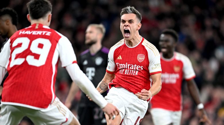 LONDON, ENGLAND - APRIL 09: Leandro Trossard of Arsenal celebrates with teammate Kai Havertz after scoring his team's second goal during the UEFA Champions League quarter-final first leg match between Arsenal FC and FC Bayern MÃ¼nchen at Emirates Stadium on April 09, 2024 in London, England. (Photo by Stuart MacFarlane/Arsenal FC via Getty Images)