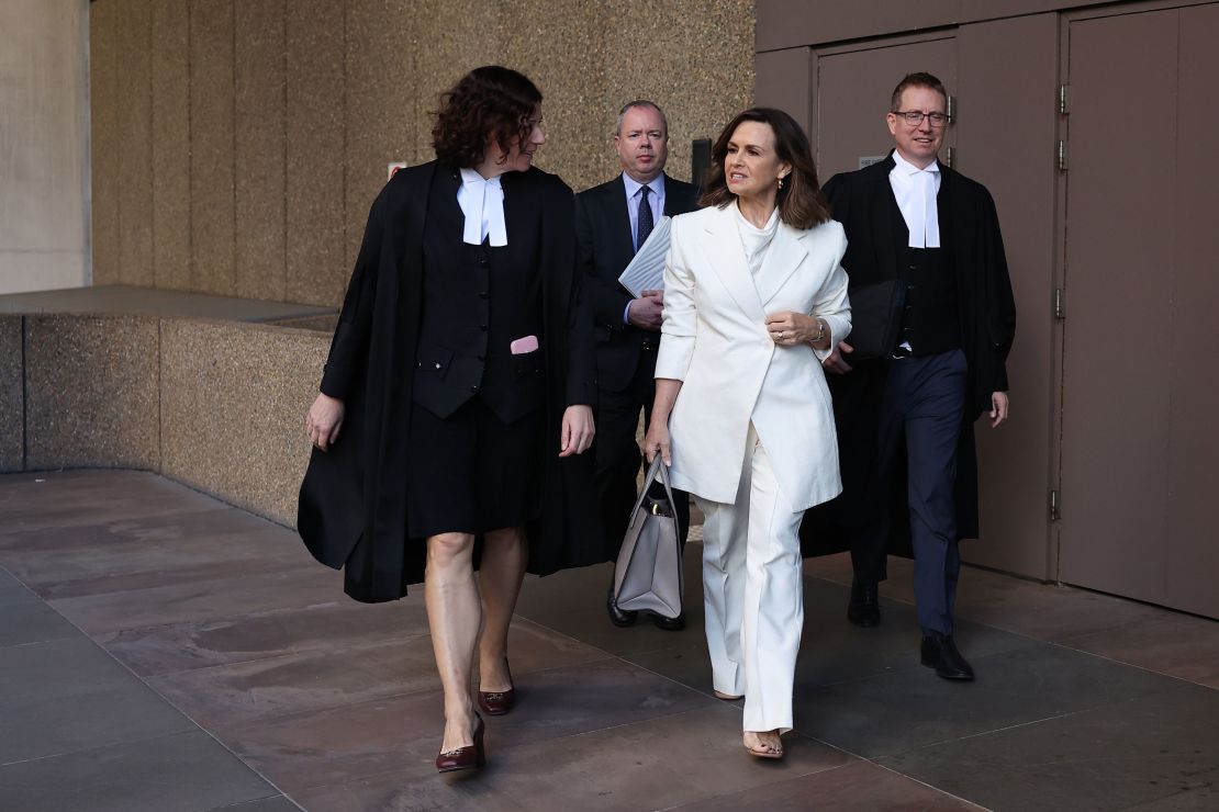 Lisa Wilkinson (in white) arrives at court on April 15, 2024 in Sydney, Australia.