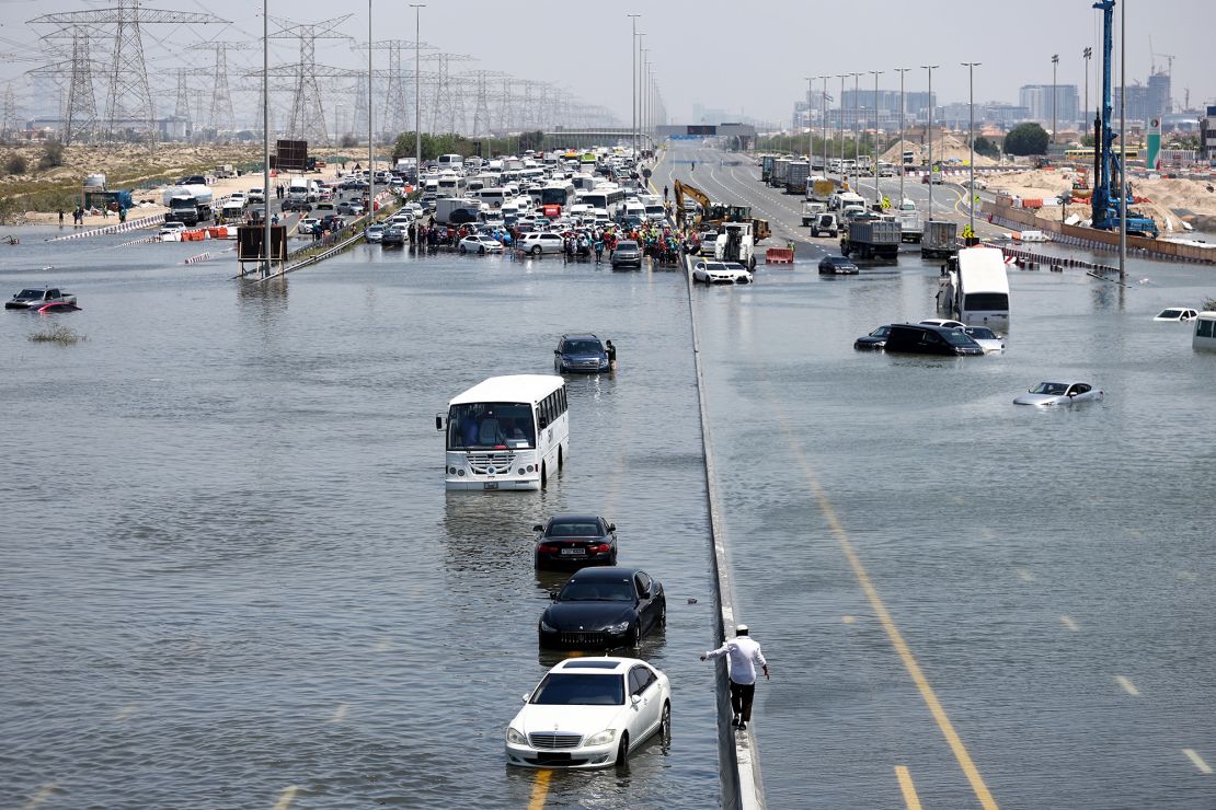 A general view of abandoned vehicles on a flooded highway can be seen on April 18, 2024 in Dubai.