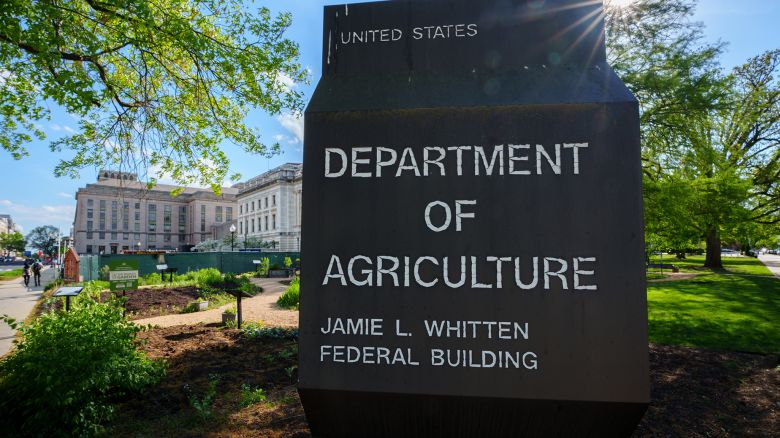 WASHINGTON, DC - APRIL 18: The sun flares over the top of the sign marking the headquarters building for the US Department of Agriculture on April 18, 2024, in Washington, DC. (Photo by J. David Ake/Getty Images)