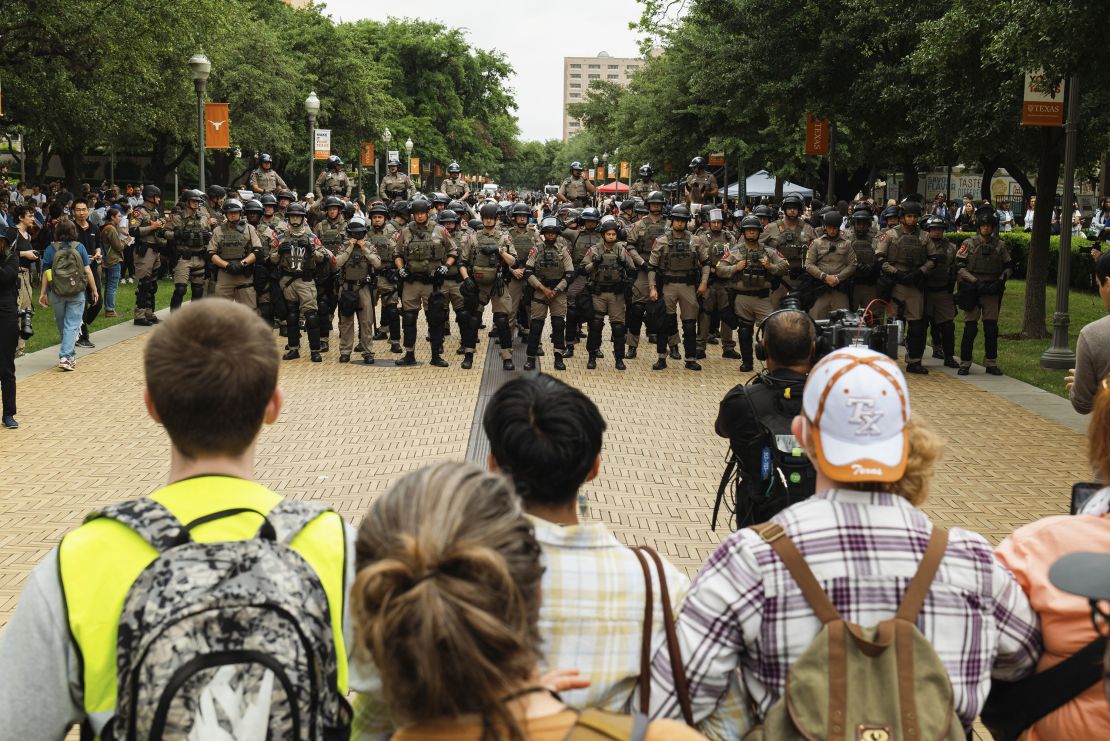 Pro-Palestinian demonstrators face off with Texas DPS officers on Wednesday, April 24, 2024.