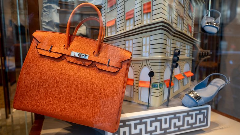 A handbag on display at a Hermes International SA luxury clothing boutique in Paris, France, on Thursday, April 25, 2024. Hermes saw Chinese buyers snap up its luxury products as the Kelly bag maker showed its resilience amid a broader slowdown in demand for the sector. Photographer: Benjamin Girette/Bloomberg via Getty Images