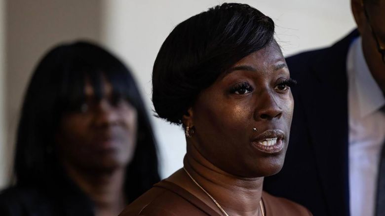 Crystal Mason and her attorneys speak to the media gathered regarding her acquittal in a high-profile voting rights case at the Tim Curry Criminal Justice Center on March 29, 2024, in Fort Worth, Texas. (Chris Torres/Fort Worth Star-Telegram/Tribune News Service via Getty Images)