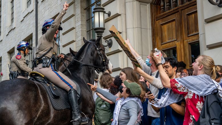 AUSTIN, TEXAS - APRIL 24: Mounted police work to contain demonstrators protesting the war in Gaza at the University of Texas at Austin on April 24, 2024 in Austin, Texas. Students walked out of class as protests continue to sweep college campuses around the country. (Photo by Brandon Bell/Getty Images)