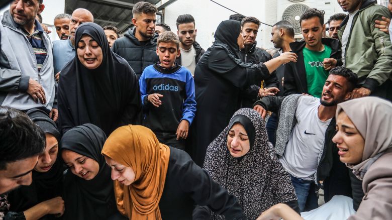 Relatives of Palestinian victims who lost their lives following an Israeli airstrike, take their bodies from the morgue of Rafah's El-Najar Hospital for burial on April 29, 2024.