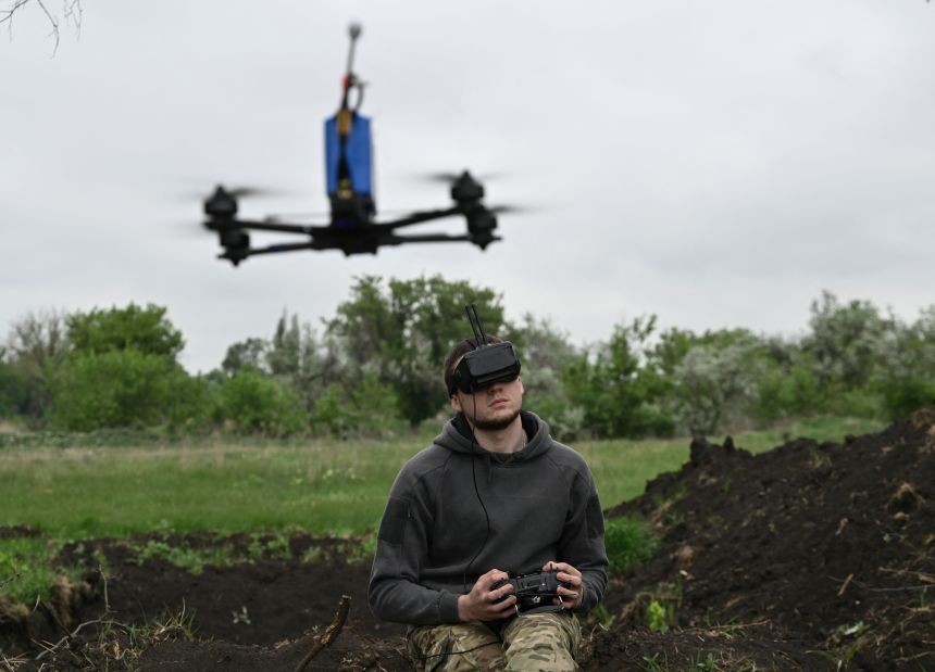 Ukrainian serviceman of the 28th brigade Maksym, 20, conducts a training flight with an FPV drone in Donetsk region on April 29, 2024, amid the Russian invasion of Ukraine.