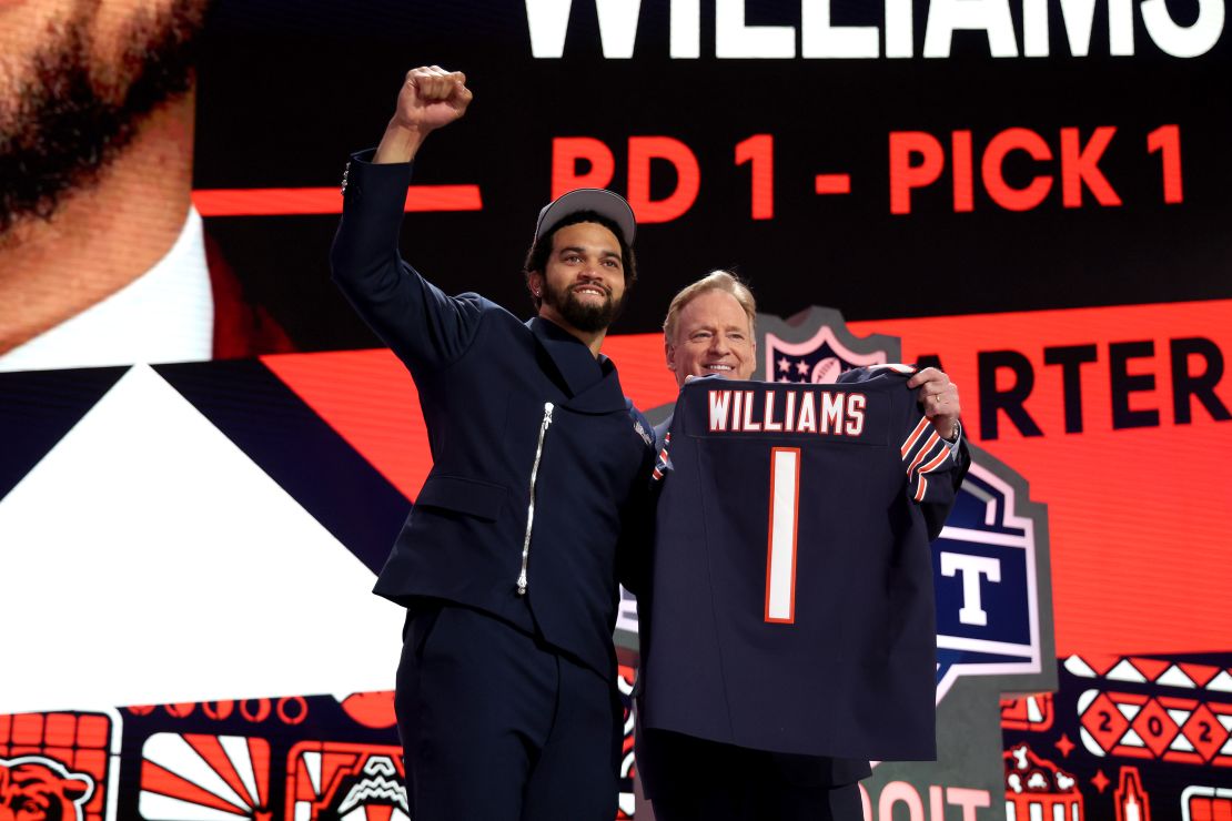 Caleb Williams poses with NFL Commissioner Roger Goodell after being selected by the Chicago Bears.