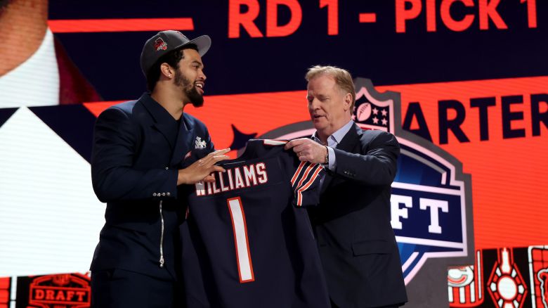 DETROIT, MICHIGAN - APRIL 25: (L-R) Caleb Williams poses with NFL Commissioner Roger Goodell after being selected first overall by the Chicago Bears during the first round of the 2024 NFL Draft at Campus Martius Park and Hart Plaza on April 25, 2024 in Detroit, Michigan. (Photo by Gregory Shamus/Getty Images)