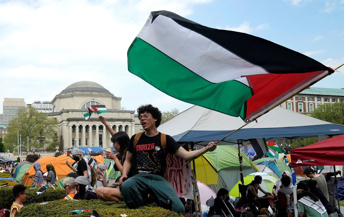 Protestors wave Palestinian flags on the West Lawn of Columbia University in New York on April 29, 2024.