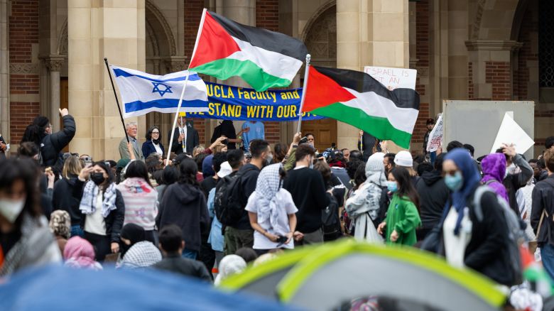 Pro-Palestinian demonstrators and Pro-Israel demonstrators clash with each other on the campus of the University of California Los Angeles (UCLA) on April 25, 2024 in Los Angeles, California.