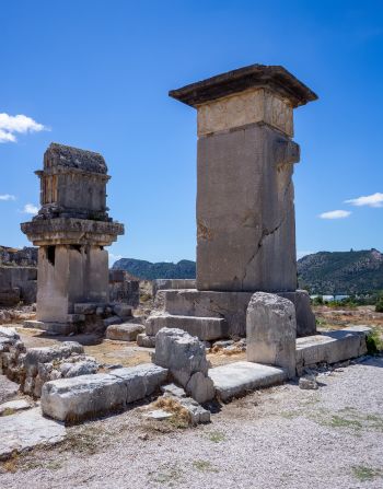 <strong>Pillar tombs: </strong>Some Lycian dead were placed in tombs atop pillars, such as these found in Xanthos Ancient City, near the present-day village of Kinik, in Turkey's southwestern Antalya Province.