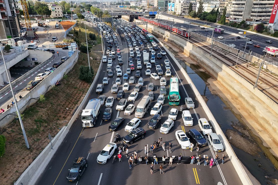 Relatives and supporters of Israeli hostages block Ayalon Highway in Tel Aviv on Thursday.