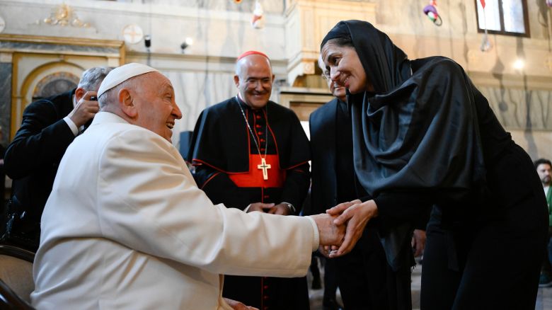 Pope Francis greets an artist of the Venice Art Biennale in the Church of La Maddalena in the Giudecca's women's prison facility on April 28, 2024 in Venice, Italy. Addressing the group the Pope praised artists as true visionaries who can see beyond the boundaries of our world.