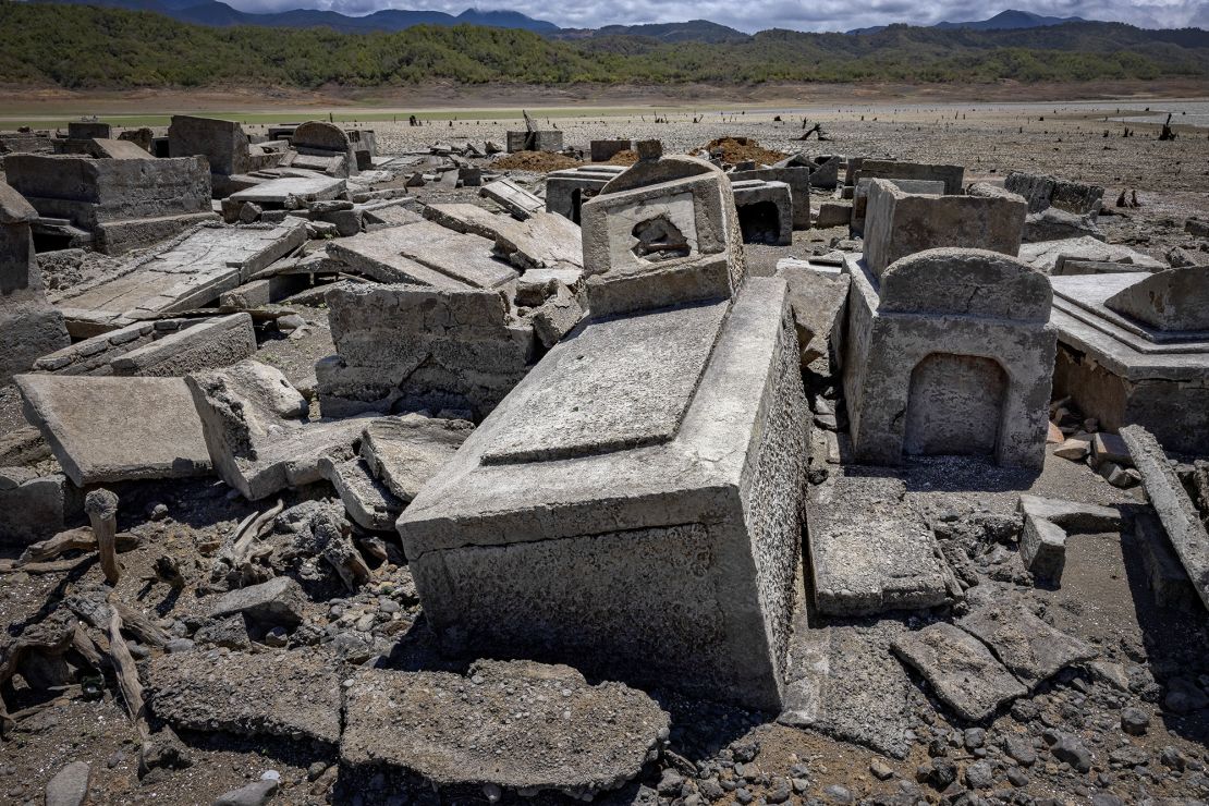 Tombstones are among the relics uncovered in the dried up dam.