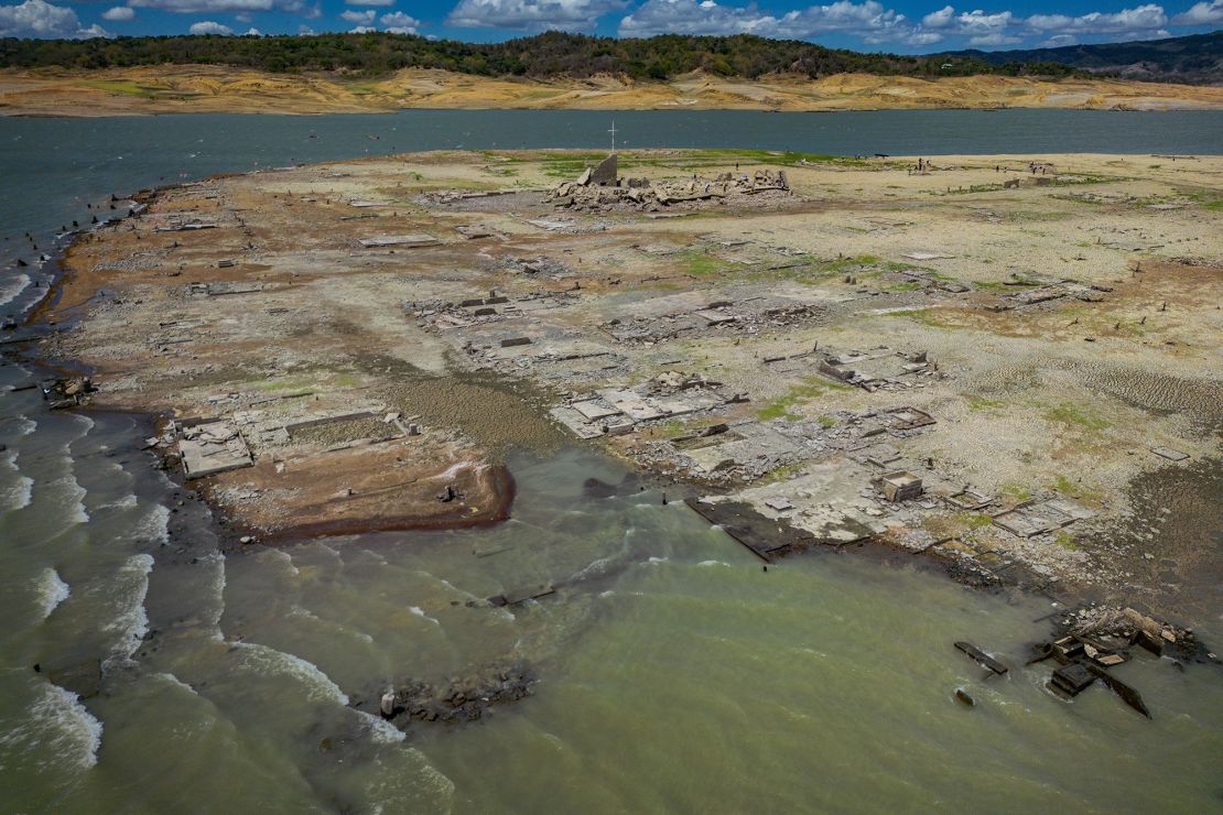 Water still surrounds the dried up part of the dam. A lack of rain has pushed the water levels down.