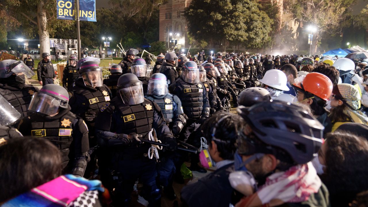 Members of law enforcement enter a Pro-Palestinian encampment at UCLA on May 2, 2024 in Los Angeles, California.