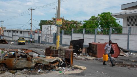 People flee their neighborhoods after after armed gangs terrorized the Delmas 24 and Solino areas on the night of May 1, in Port-au-Prince, Haiti.