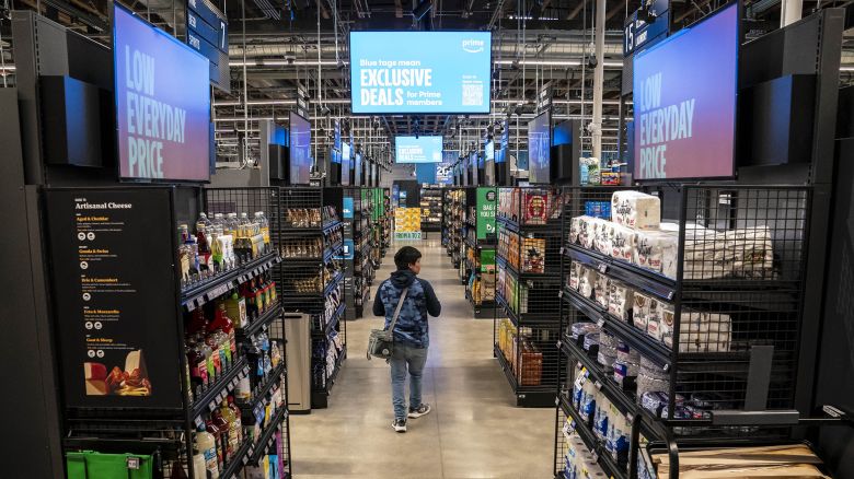 A shopper walks through an Amazon Fresh grocery store in Seattle, Washington, US, on Thursday, May 2, 2024.