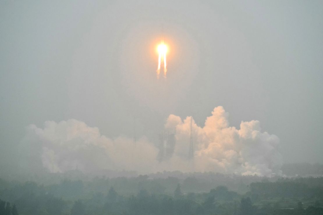Space fans gathered to watch the launch on south China's Hainan Island