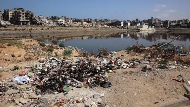 Rubbish accumulates along a non-functioning sewage dump, attracting mosquitos and other insects, causing a health hazard in the area in Gaza City, on May 3, 2024, amid the ongoing conflict between Israel and the militant group Hamas.