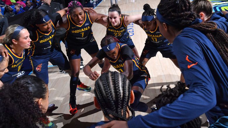 Maya Caldwell #11 of the Indiana Fever dances in the huddle before the game against the Dallas Wings during the WNBA Preseason Game on May 3, 2024 at the College Park Center in Arlington, Texas.