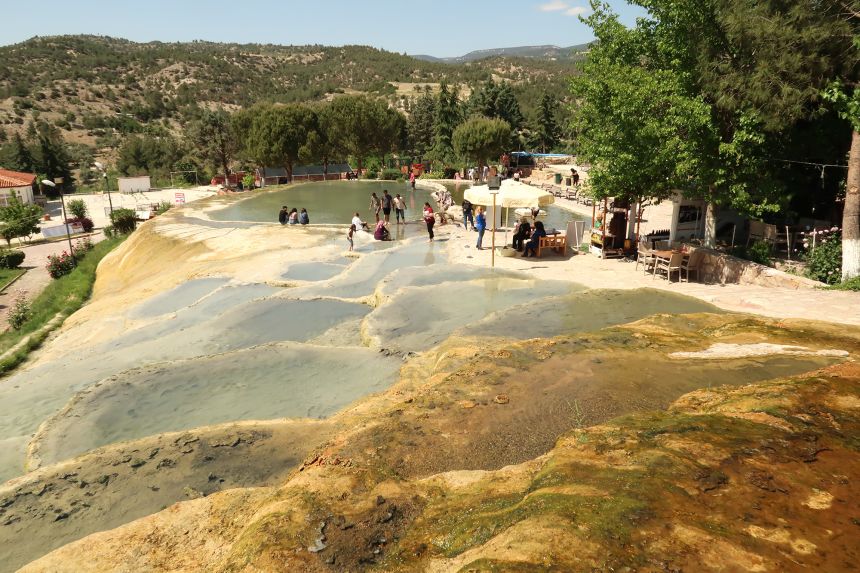 In Karahayut, a spa town near Pamukkale, geothermal springs leave red deposits in their wake.