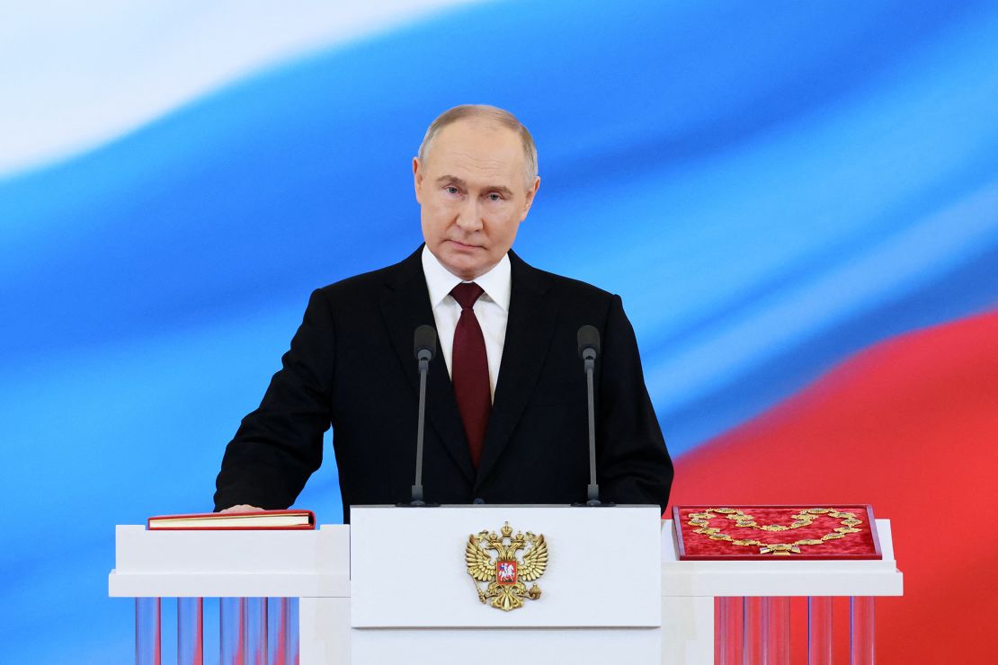 Russian President Vladimir Putin takes the oath of office during a ceremony at the Kremlin in Moscow on May 7, 2024.
