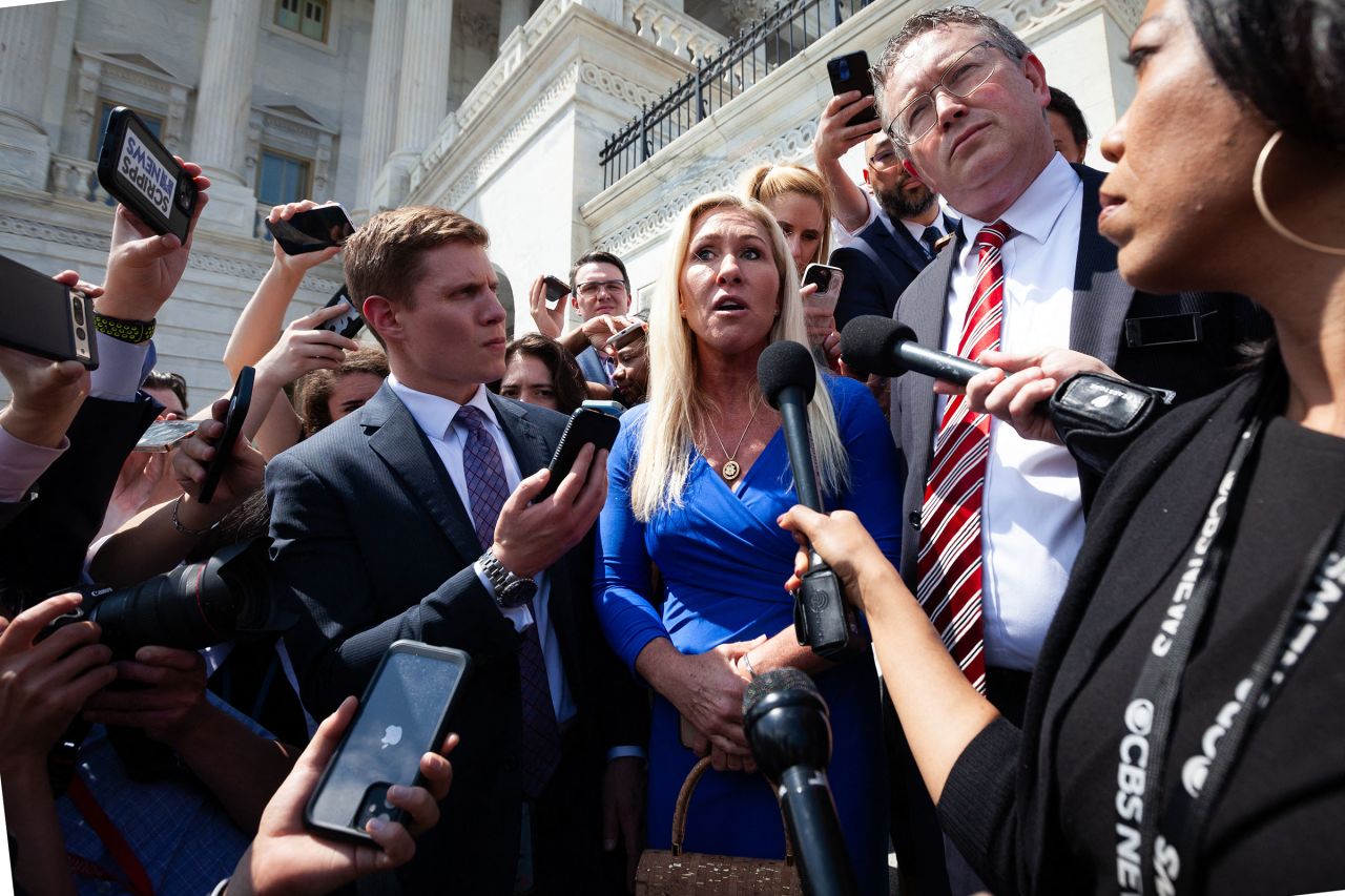 Reps. Marjorie Taylor Greene speaks with reporters after meeting with House Speaker Mike Johnson in Washington, DC, in May.