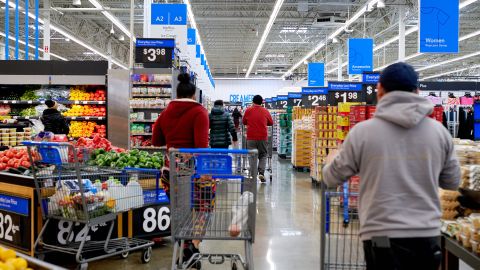 Shoppers at a Walmart store in Secaucus, New Jersey, US, on Tuesday, March 5, 2024. Walmart is revamping more than 800 store locations and adding high-end products.