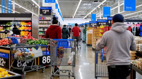 Shoppers at a Walmart store in Secaucus, New Jersey, US, on Tuesday, March 5, 2024. Walmart is revamping more than 800 store locations and adding high-end products.