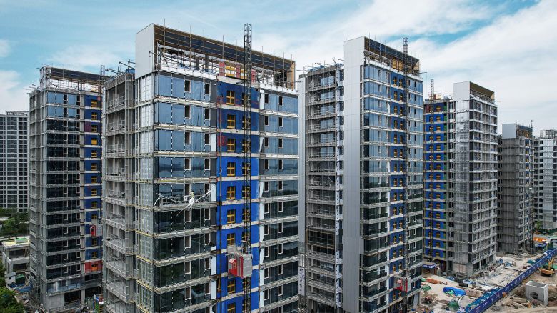 This picture shows residential buildings under construction by Chinese real estate developer Vanke in Hangzhou, in eastern China's Zhejiang province on May 9, 2024.