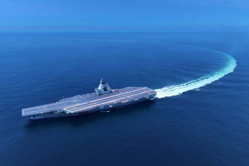 An aerial drone photo taken on May 7, 2024, shows China's third aircraft carrier, the Fujian, during its maiden sea trials.