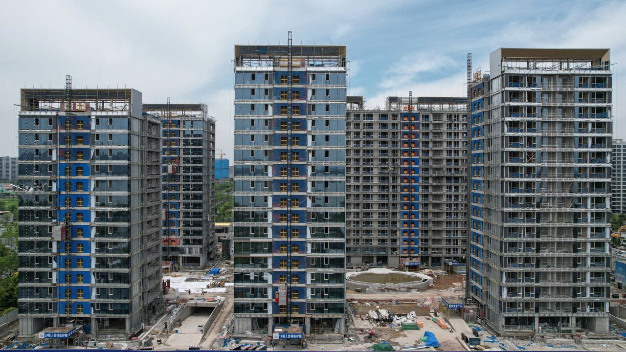 This picture shows residential buildings under construction by Chinese real estate developer Vanke in Hangzhou, in eastern China's Zhejiang province on May 9, 2024. (Photo by AFP) / China OUT (Photo by STR/AFP via Getty Images)