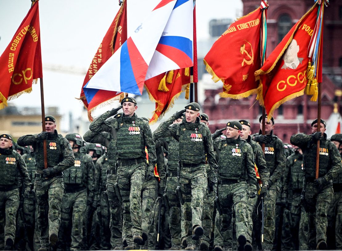 Russian servicemen march on the Red Square ahead of the Victory Day parade in central Moscow on May 9, 2024.